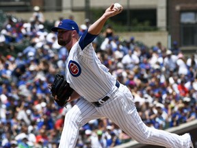Chicago Cubs starting pitcher Jon Lester delivers during the first inning of an baseball game against the Minnesota Twins, Sunday, July 1, 2018, in Chicago.