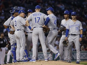 Kansas City Royals manager Ned Yost (3) talks to his team during the third inning of a baseball game against the Chicago White Sox, Friday, July 13, 2018, in Chicago.