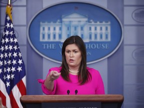 White House press secretary Sarah Huckabee Sanders points to a reporter to take a question as she speaks during the daily press briefing at the White House, Monday, July 23, 2018, in Washington.