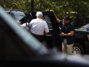 President Donald Trump boards his motorcade vehicle outside the West Wing of the White House in Washington, Wednesday, July 4, 2018, en route to Trump National Golf Club in Sterling, Va.