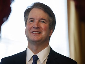 Supreme Court nominee Brett Kavanaugh smiles during a meeting with Sen. Orrin Hatch, R-Utah, on Capitol Hill, Wednesday, July 11, 2018, in Washington.