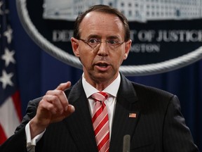Deputy Attorney General Rod Rosenstein speaks during a news conference at the Department of Justice, Friday, July 13, 2018, in Washington.