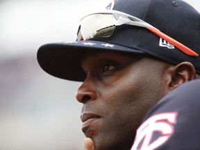 US manager Torii Hunter watches play against the World team in the first inning of the All-Star Futures baseball game, Sunday, July 15, 2018, at Nationals Park, in Washington. The the 89th MLB baseball All-Star Game will be played Tuesday.