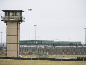 FILE - In a Wednesday, Feb. 1, 2017 file photo, Vaughn Correctional Center near Smyrna, Del., remains on lockdown following a disturbance. A building at Delaware's maximum-security prison that was the site of a deadly inmate riot and hostage-taking last year will be torn down, officials said Monday, July 16, 2018. Demolition of the C Building at James T. Vaughn Correctional Center is expected to begin this fall, Department of Correction officials said in a news release. The building has been vacant since February 2017, when inmates rioted, taking three staffers hostage and killing correctional officer Steven Floyd.