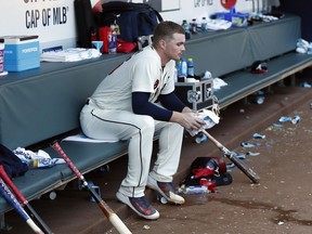 Atlanta Braves starting pitcher Sean Newcomb sits on the bench after losing his bid for a no-hitter with two outs in the ninth inning against the Los Angeles Dodgers on Sunday, July 29, 2018, in Atlanta.