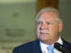 Ontario Premier Doug Ford speaks to reporters at Queen’s Park in Toronto on July 11, 2018.