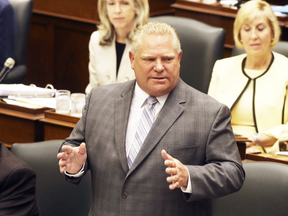 Premier Doug Ford  speaks about the downsizing of Toronto city council at the Ontario Legislature on July 30, 2018.