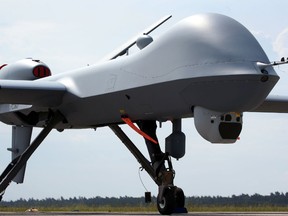 An MQ9 Predator drone is displayed at the Berlin Air Show ILA in Berlin, Germany, Monday, May 30, 2016. MQ-9 drones currently flying out of Niger’s capital will eventually be moved to Nigerien Air Base 201, which is being built in Agadez, on the scorching edge of the Sahara Desert.