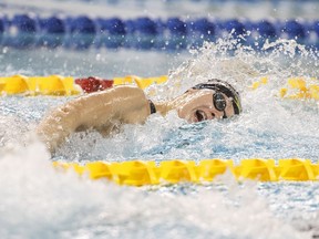 Penny Oleksiak won the 100-metre freestyle Thursday at the Canadian team trials for the Pan Pacific Championships.