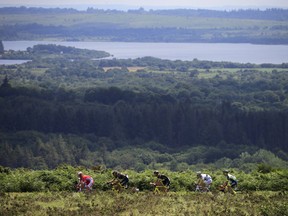 The pack rides during the sixth stage of the Tour de France cycling race over 181 kilometers (112.5 miles) with start in Brest and finish in Mur-de-Bretagne Guerledan, France, Thursday, July 12, 2018.