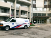 A Toronto Police van parks in front of the Thorncliffe Park apartment building where shooting suspect Faisal Hussain lived with his parents, on July 23, 2018.