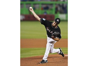 Miami Marlins starting pitcher Trevor Richards delivers during the first inning of a baseball game against the Philadelphia Phillies, Saturday, July 14, 2018, in Miami.