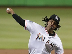 Miami Marlins starting pitcher Jose Urena delivers during the first inning of a baseball game against the Washington Nationals, Sunday, July 29, 2018, in Miami.