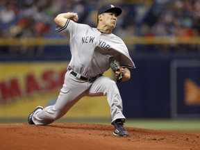 New York Yankees starting pitcher Masahiro Tanaka throws during the first inning of a baseball game Tuesday, July 24, 2018, in St. Petersburg, Fla.