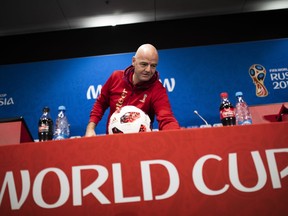 FIFA President Gianni Infantino arrives to a news conference during the 2018 soccer World Cup at the Luzhniki stadium in Moscow, Russia, Friday, July 13, 2018.