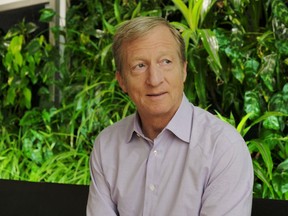 In this photo taken Wednesday, June 27, 2018, environmental activist & billionaire Tom Steyer poses at his offices in San Francisco. Arizona's largest utility is fiercely opposing a push to mandate increased use of renewable energy in the sun-drenched state, setting up a political fight over the measure funded by Steyer.