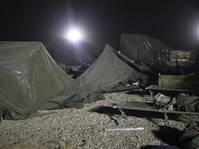 This photo provided by the U.S. Army shows a tent that was blown down by a helicopter injuring 22 people at the Fort Hunter Liggett military base in California on Wednesday, July 18, 2018. A U.S. Army UH-60 Blackhawk helicopter was landing about 9:30 p.m. when the wind from its rotor caused the tent to collapse, said Amy Phillips, public information officer at the Monterey County base.