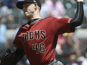 Arizona Diamondbacks' Patrick Corbin pitches against the Atlanta Braves during the first inning of a baseball game Sunday, July 15, 2018, in Atlanta.