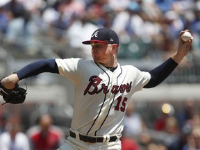 Atlanta Braves starting pitcher Sean Newcomb (15) works in the first inning of a baseball game against the Los Angeles Dodgers Sunday, July 29, 2018 in Atlanta.