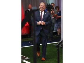 Texas A&M head coach Jimbo Fisher arrives on stage for NCAA college football Southeastern Conference media days at the College Football Hall of Fame in Atlanta, Monday, July 16, 2018.