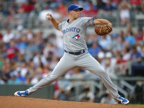 Toronto Blue Jays starting pitcher Sam Gaviglio delivers in the first inning of the team's baseball game against the Atlanta Braves, Wednesday, July 11, 2018, in Atlanta.