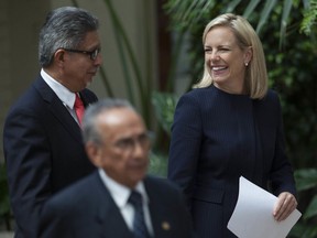 The Foreign Minister of El Salvador, Carlos Castaneda, left, and U.S. Homeland Security Secretary Kirstjen Nielsen talk before a press conference in Guatemala City, Tuesday, July 10, 2018. Nielsen is in Guatemala to meet with the Central American and Mexican foreign ministers on immigration issues.