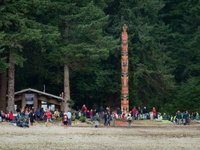 The Gwaii Haanas legacy totem pole is seen after being raised in Windy Bay, B.C., on Lyell Island in Haida Gwaii on Thursday August 15, 2013. Despite a declining population, the archipelago's largest village of Queen Charlotte has almost no vacancy and both council and a housing report have pointed to Airbnb and increased tourism as a problem.