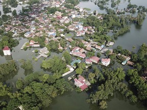 An aerial view of flooded village in Chuong My district, Hanoi, Vietnam on Tuesday, July 31, 2018. High seasonal floods have killed three people and threat to submerge Vietnam's capital.