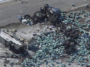 The wreckage of a fatal crash outside of Tisdale, Sask., is seen Saturday, April, 7, 2018. Saskatchewan RCMP say they are preparing to talk to Crown prosecutors about potential charges in the Humboldt Broncos bus crash as its investigation continues. Police say they are still analyzing the data and evidence gathered from the scene of the April 6 collision between the bus and a semi-truck.