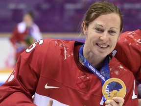 Jayna Hefford with her gold medal at the Sochi Winter Olympics in 2014.