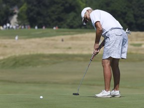 Elaine Crosby putts on the 11th during the second round of the inaugural U.S. Senior Women's Open golf tournament in Wheaton, Ill., Friday , July 13, 2018.