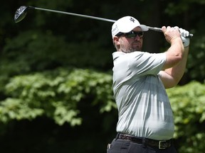 Steve Wheatcroft hits on the 17th hole during the first-round of the John Deere Classic golf tournament Thursday, July 12, 2018, in Silvis, Ill.