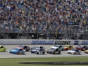 Drivers start a NASCAR Cup Series auto race at Chicagoland Speedway in Joliet, Ill., Sunday, July 1, 2018.