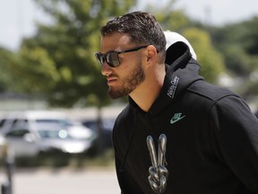 Chicago Bears quarterback Mitchell Trubisky walks to a news conference during an NFL football training camp in Bourbonnais, Ill., Thursday, July 19, 2018.