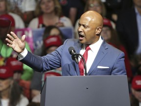 In this May 10, 2018 photo, Curtis Hill, Indiana's Attorney General, warms up the crowd at the Trump and Pence rally in Elkhart, Ind. Indiana's Democratic Party chairman is urging  Hill to resign after he was investigated because four women accused him of inappropriate touching. Chairman John Zody said the allegations against Hill are "beyond troubling and wildly inappropriate." Indiana Republican Party Chairman Kyle Hupfer says the GOP has "zero tolerance for sexual harassment," but stopped short of calling for Hill's resignation. Hill's office did not respond to a request for comment Tuesday, July 2, 2018.