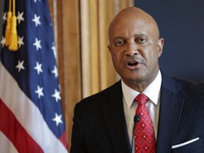 Indiana Attorney General Curtis Hill speaks during a news conference at the Statehouse in Indianapolis, Monday, July 9, 2018. Hill is rejecting calls to resign, saying his name "has been dragged through the gutter" amid allegations that he inappropriately touched a lawmaker and several other women. The Republican said during the news conference that he stands "falsely and publicly accused of abhorrent behavior."
