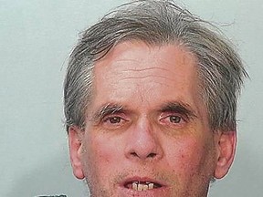This booking photo released by the Fort Wayne, Ind., Police Department shows John D. Miller, arrested Sunday, July 15, 2018, who arrested on preliminary murder, child molesting and criminal confinement charges in April Marie Tinsley's slaying. The Fort Wayne girl's body was found in a ditch three days after her April 1988 abduction about 20 miles away. (Fort Wayne Police/The Journal-Gazette via AP)