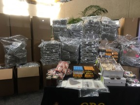 Seized marijuana and and various marijuana products are seen at RCMP headquarters in Winnipeg on Friday, July 27, 2018. A routine check stop on a Manitoba highway has resulted in the largest marijuana drug bust through a traffic stop in Canada for three years.