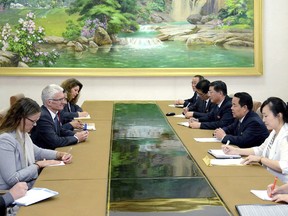 In this Wednesday, July 11, 2018, photo by the North Korean government, Undersecretary General for Humanitarian Affairs Mark Lowcock, third from left, listens to North Korean Health Minister Jang Jun Sang, third from left, during a meeting in Pyongyang, North Korea. The senior U.N. official visiting North Korea is highlighting malnutrition, drinking water and a shortage of medicines as problems facing the country. Independent journalists were not given access to cover the event depicted in this image distributed by the North Korean government. The content of this image is as provided and cannot be independently verified. (Korean Central News Agency/Korea News Service via AP)