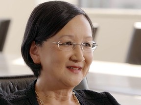 In this March 1, 2018 image taken from video provided by the National Asian Pacific American Bar Association, U.S. District Judge Dolly Gee speaks in Los Angeles. The Trump administration's effort to detain migrant families together faces a formidable obstacle in a diminutive Los Angeles judge. Gee is best known for a series of decisions on immigration in which she has often ruled against the government. Gee is the first Chinese-American woman appointed to a federal trial court and she says her upbringing was shaped as the child of immigrants. (National Asian Pacific American Bar Association/NAPABA via AP)