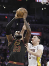 In this March 11 file photo, Cleveland Cavaliers forward LeBron James (left) drives to the hoop against Los Angeles Lakers guard Lonzo Ball.