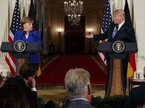 FILE - In this file photo from April 27, 2018, President Donald Trump speaks during a news conference with German Chancellor Angela Merkel in the East Room of the White House in Washington. Trump said in Brussels on Wednesday, July 11, 2018, that a pipeline project has made Germany "totally controlled" by and "captive to Russia." The steady drum of anti-German rhetoric from one of the country's traditionally closest friends has started people wondering whether to get ready for a messy breakup.