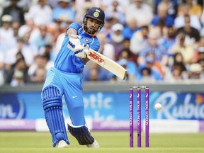 India's Shikhar Dhawan in action during the third One Day international cricket match between England and India at Emerald Headingley, Leeds, England, Tuesday, July 17, 2018.