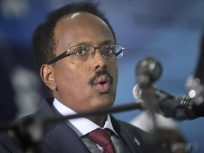 FILE - In this Wednesday, Feb. 22, 2017 file photo, Somalia's President Mohamed Abdullahi Mohamed speaks at his inauguration ceremony in Mogadishu, Somalia. Somalia's president has begun a visit to Eritrea on Saturday July 28, 2018, in another possible diplomatic thaw in the restless Horn of Africa region. The two nations have not had diplomatic relations for nearly 15 years.