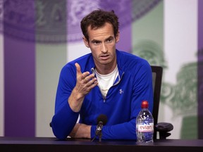 Andy Murray talks to the media during a press conference at The All England Lawn Tennis and Croquet Club in Wimbledon, London, England, in this photo dated Saturday June 30, 2018. It is announced Sunday July 1, 2018, that two-time champion Andy Murray has pulled out of the Wimbledon championships because of a bad hip. Wimbledon is scheduled to start Monday July 2.