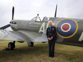 FILE - In this file photo dated Aug. 18, 2015, showing RAF Veteran World War II pilot Mary Ellis posing with a Spitfire at Biggin Hill Airfield, England. The Second World War pilot Ellis has died at the age of 101, is is announced Thursday July 26, 2018. Mary Ellis delivered spitfires and bombers to the front line during the war as a member of the Air Transport Auxiliary (ATA), flying over 1,000 planes during the conflict before moving to the Isle of Wight to manage Sandown airport from 1950 to 1970.