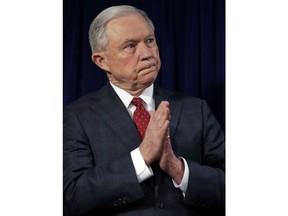 U.S. Attorney General Jeff Sessions listens during a news conference at the Moakley Federal Building in Boston, Thursday, July 26, 2018. Sessions is defending his top deputy after some Congressional Republicans moved to impeach him. Sessions said Thursday in Boston that he has the "highest confidence" in Deputy Attorney General Rod Rosenstein. He suggested lawmakers instead focus on reforming the nation's immigration system.