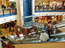 Shoppers ride an escalator in Calgary's Chinook Centre.