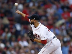 Boston Red Sox's Rick Porcello pitches during the first inning of a baseball game against the Minnesota Twins in Boston, Saturday, July 28, 2018.