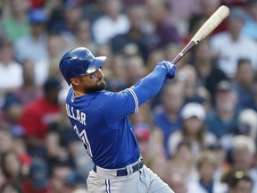 Toronto Blue Jays' Kevin Pillar follows through on an RBI-double during the second inning of a baseball game against the Boston Red Sox in Boston, Friday, July 13, 2018.